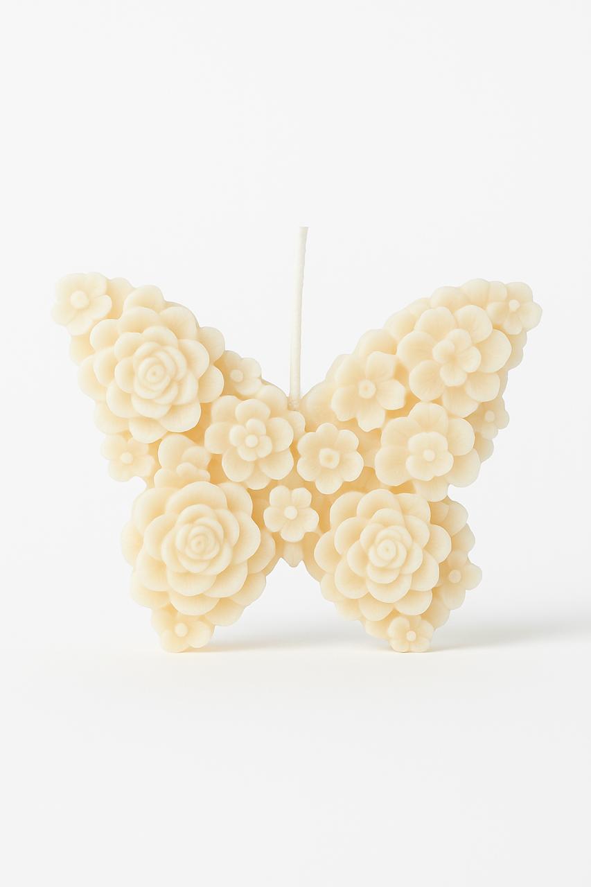 Vela mariposa floral